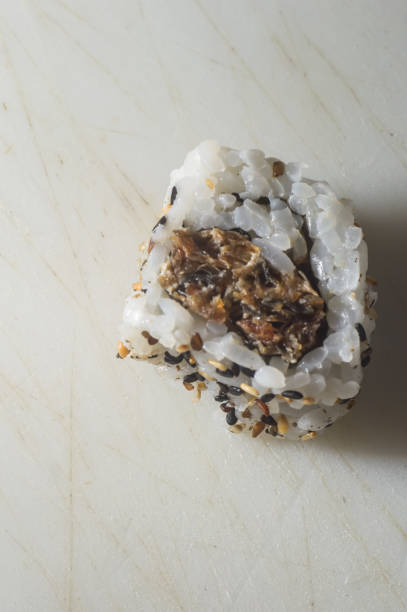 uramaki sushi on a white plate with copy space, selective focus