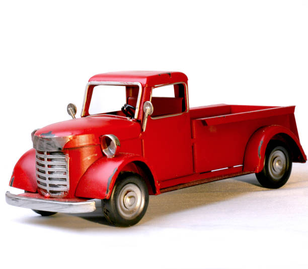 istock Decorative tin red truck on angle 1350011752