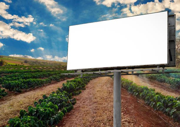 istock Blank Empty billboard mockup with white screen against clouds and blue sky background. Copy space banner for advertisement. Space for text. 1350020281