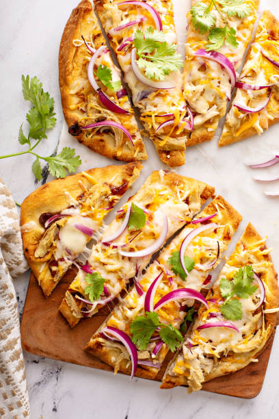 istock Barbecue chicken flatbreads with hot sauce and red onion 1350023976