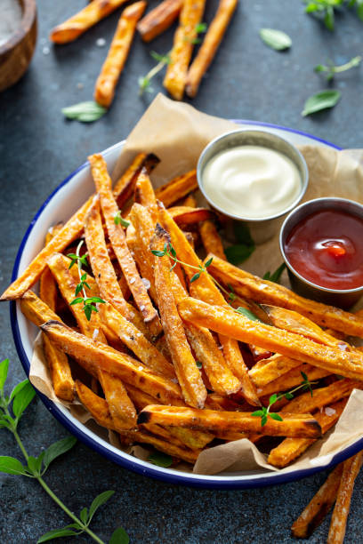istock Sweet potato fries with sauces 1350023980