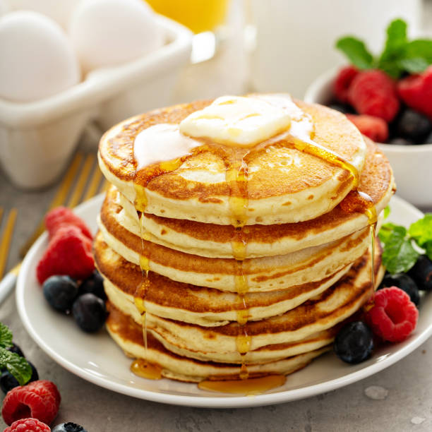 istock Fluffy buttermilk pancakes with syrup 1350024045