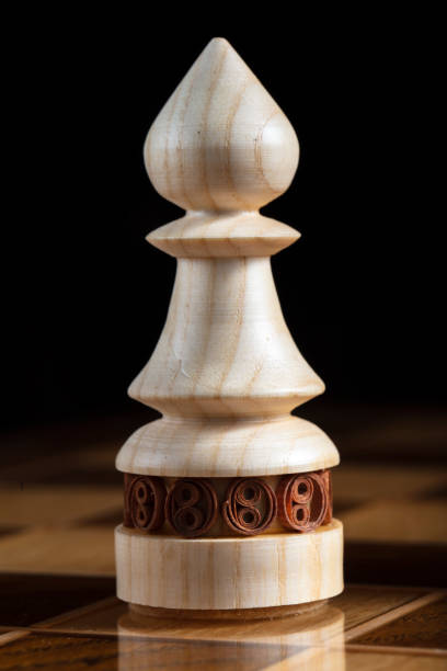 istock Chess wooden elephant. A puzzle game with tricky combinations that requires planning and thinking. 1350024544