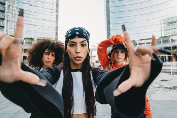 istock Three female dancer friends are posing in a modern city 1350027382