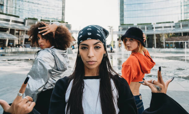 istock Three female dancer friends are posing in a modern city 1350027390