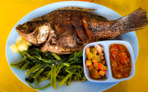 istock Fried Gouramy with dabu-dabu sauce 1350028129