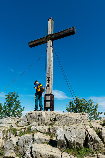 summit cross of mountain Kampenwand at Chiemgauer Alps. A very famous place in bavaria.