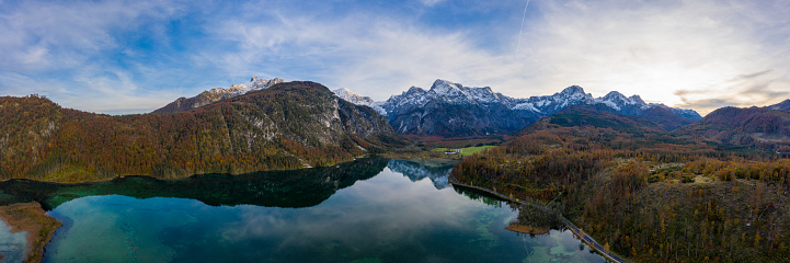 Panorama Autumn on Austrian Lake with Reflections of Mountain and Sky in Water