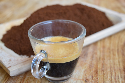 strong and creamy espresso with ground coffee