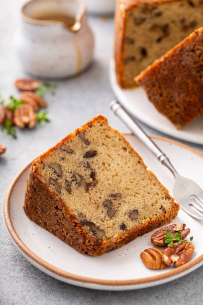 istock Traditional brown sugar pecan cake, bundt pan 1350034446
