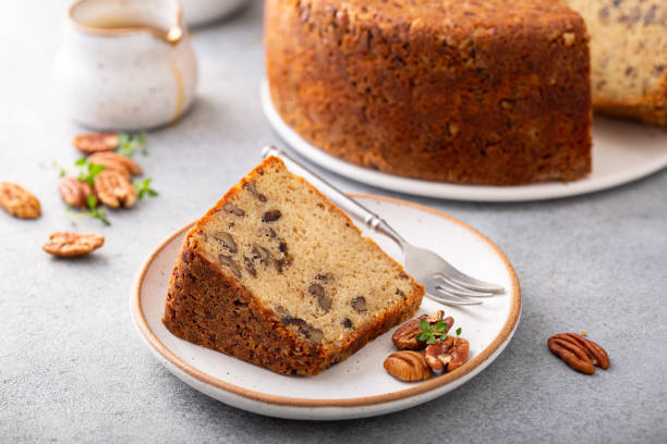 istock Traditional brown sugar pecan cake, bundt pan 1350034450