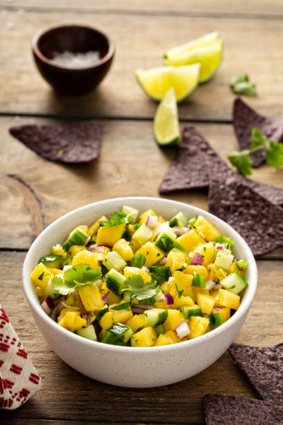 istock Pineapple and cucumber salsa with jalapeno and red onion 1350034500