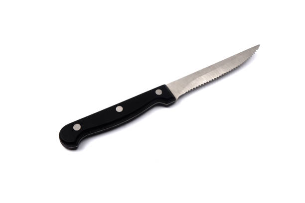 istock a small knife with prongs, isolated on a white background 1350034673