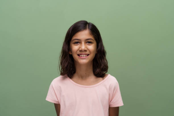 istock Beautiful little girl smiling at camera 1350037744