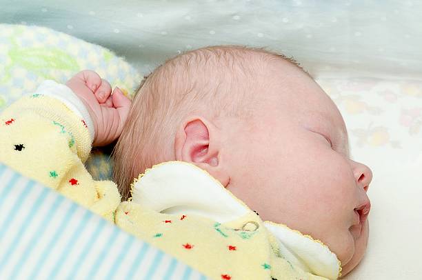 istock Newborn baby sleeps 135003847