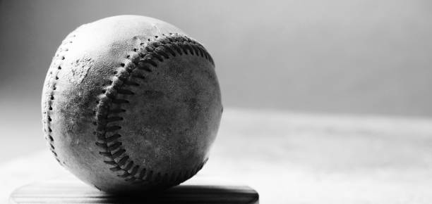 istock Old used baseball with copy space on background 1350039489