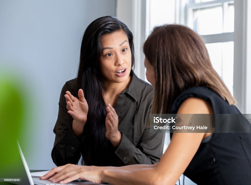 Design Team discussing Plans together Advice Stock Photo