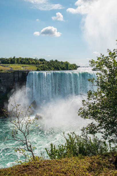istock Famous Niagara Falls on a sunny day from Canadian side 1350047138
