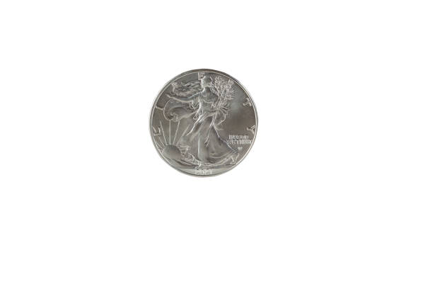 istock 2021 Walking liberty silver dollar, obverse side, isolated on white background 1350051113