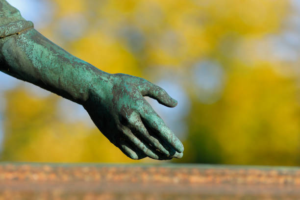istock Antique Jesus statue in a Cemetery 1350062718