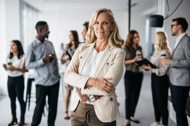 istock Successful business woman posing in an office 1350062831