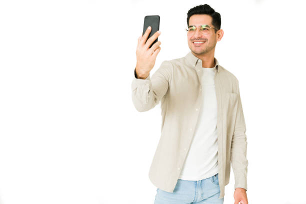 istock Good-looking man posting a picture on social media 1350063805