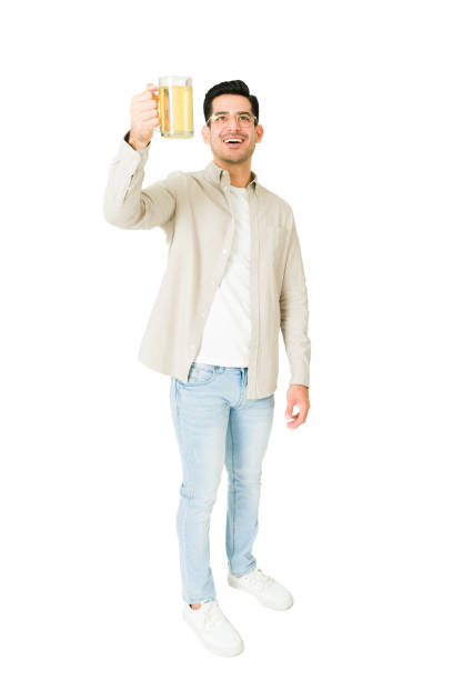 istock Excited man having fun with beer 1350063941