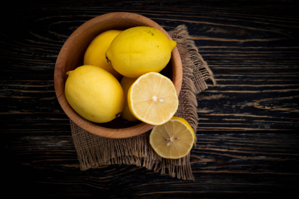 istock fresh lemon on a wooden background 1350063947