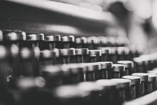 Vintage typewriter keys for typing. Close up.