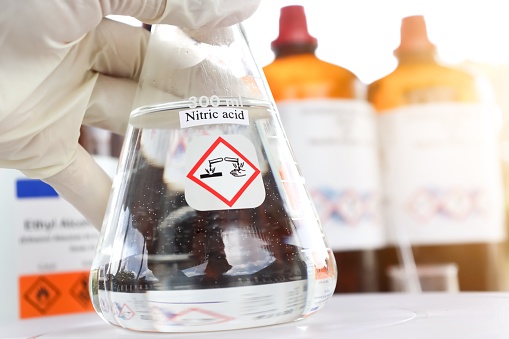 Nitric acid in glass, chemical in the laboratory and industry