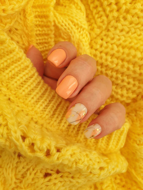 istock female hand with beautiful manicure cloth 1350074480