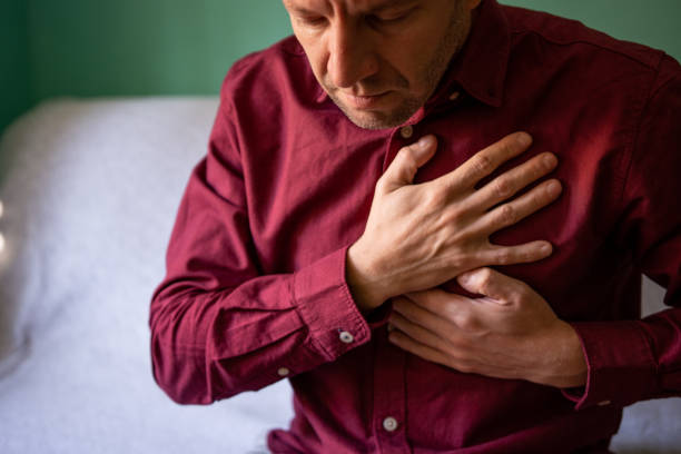 istock Businessman with chest pain 1350082304