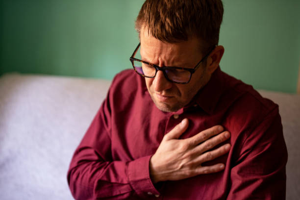 istock Businessman with chest pain 1350082325