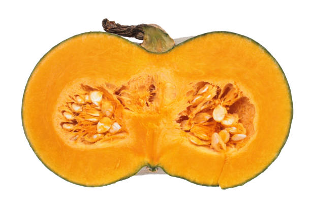 istock Orange ripe fresh pumpkin cut in half inside longitudinal section isolated on white background 1350084322