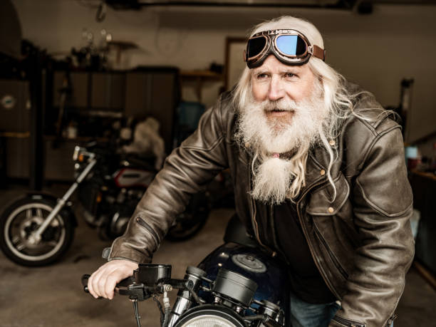 istock Senior man working on his motorcycle 1350092610