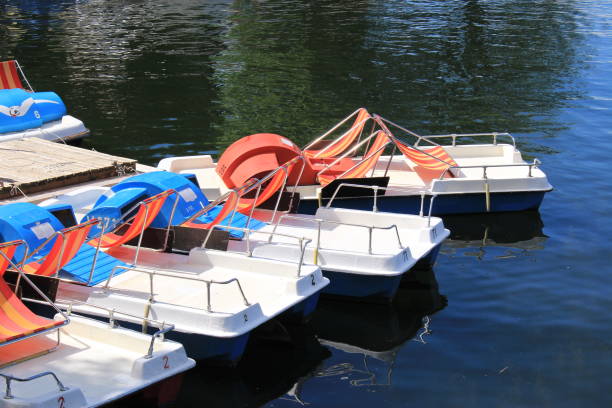 Colorful paddle boats stock photo