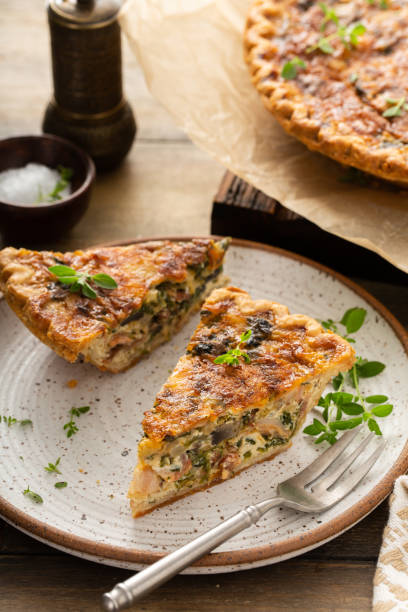 istock Bacon, mushroom and spinach quiche with cheese and herbs 1350102769