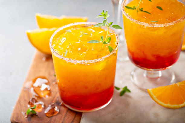 istock Tequila sunrise margarita cocktail with ice, refreshing drink 1350102777