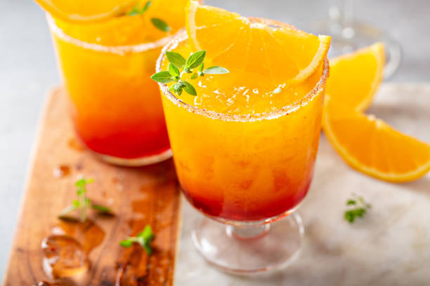 istock Tequila sunrise margarita cocktail with ice, refreshing drink 1350102785