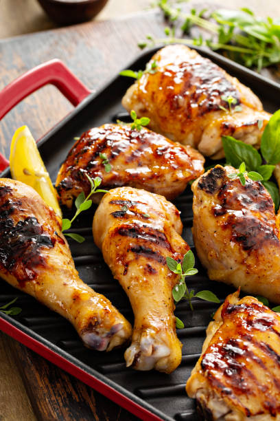 istock Grilled chicken thighs and drumsticks with honey glaze 1350102816