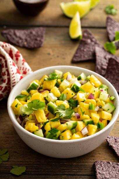 istock Pineapple and cucumber salsa with jalapeno and red onion 1350102837