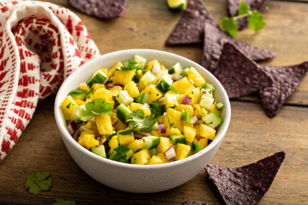 istock Pineapple and cucumber salsa with jalapeno and red onion 1350102843