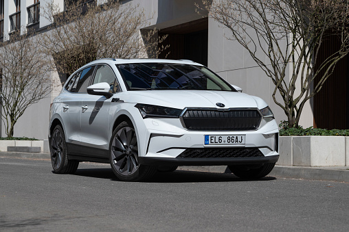 Berlin, Germany - 19th April 2021: Electric car Skoda Enyaq iV on a street in spring scenery. This model is a first mass-produced electric SUV from Skoda.