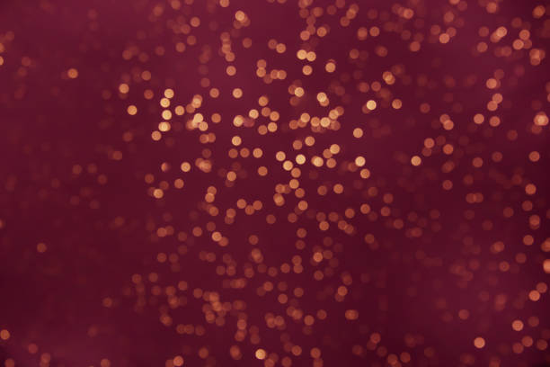 istock Christmas Background. Red Holiday glowing Abstract Glitter Defocused Background With Blinking Stars. Blurred Bokeh 1350103580