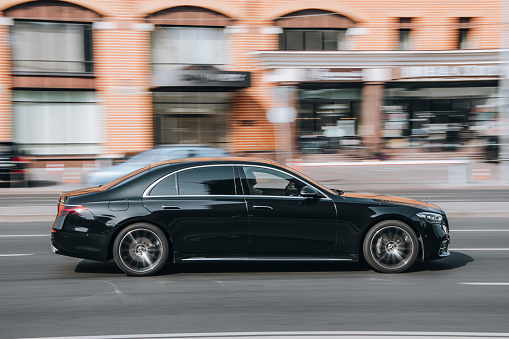 Ukraine, Kyiv - 16 July 2021: Black Mercedes-Benz A-Class car moving on the street. Editorial