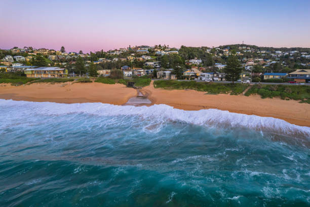 istock Surfs up aerial sunrise seascape 1350124578