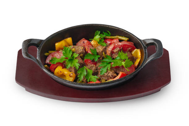istock Georgian dish with meat and vegetables isolated on white background 1350125721