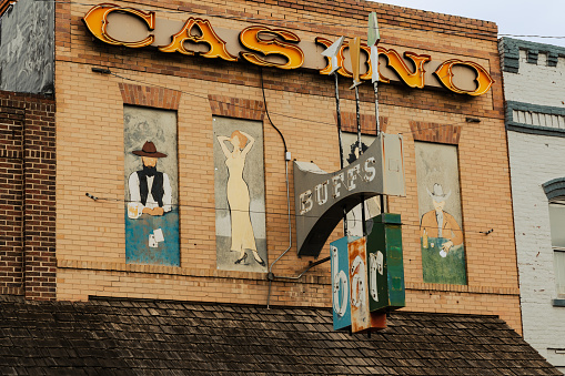 Forsyth, Montana - August 26, 2021: The classic sign of the historical Buffs Bar and casino