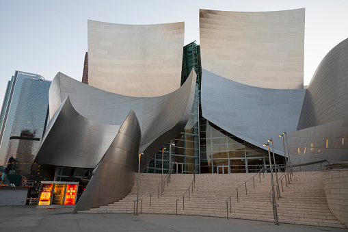 Los Angeles, California, USA- May 2019: Walt Disney Concert Hall and Grand Avenue in Downtown LA at sunset. Disney Concert Hall is home to the philharmonic orchestra