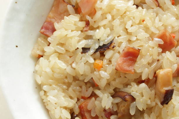 istock Chinese cooking, stir fried sticky rice 1350133332